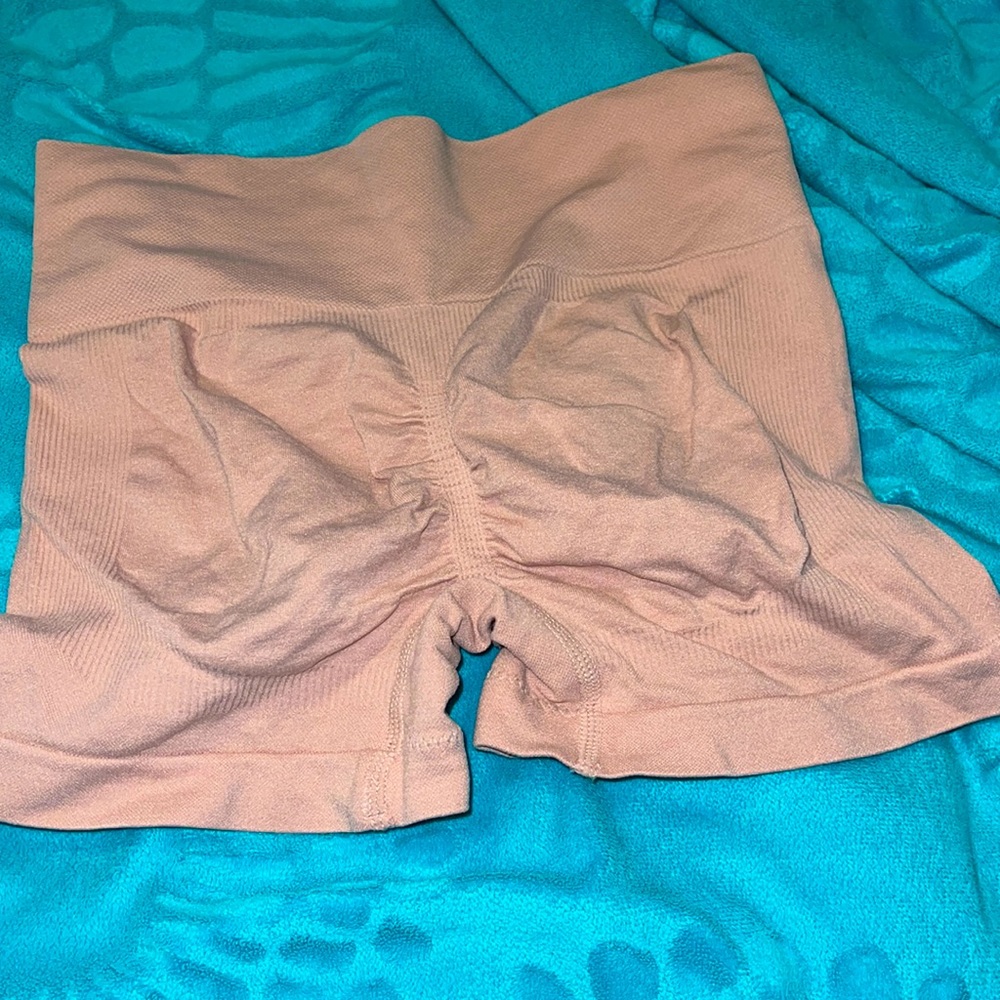 booty plumping workout shorts peach pink color onesize fits all but fits like M